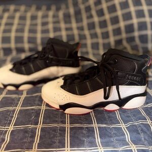 Jordan Kids Black and White Sneakers with Red Accents